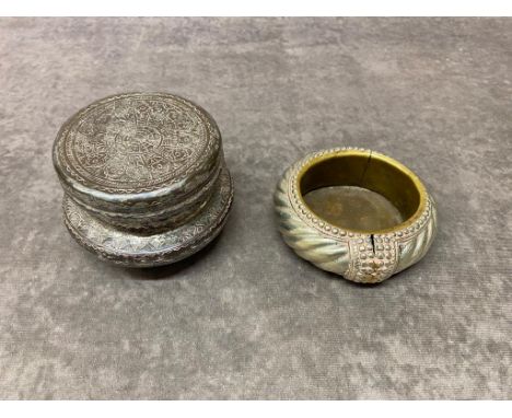 A white metal slave bracelet along with a white metal trinket box