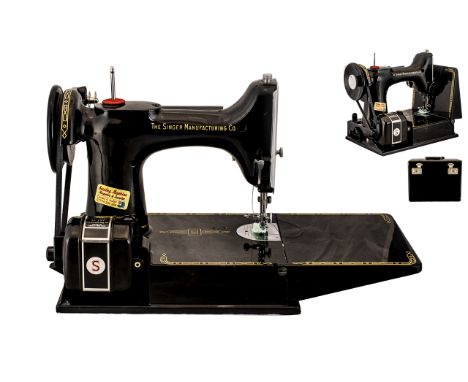 Singer Manufacturing Co Feather Weight 221.k Portable Sewing Machine complete with foot pedal and Carrying Case with Instruct