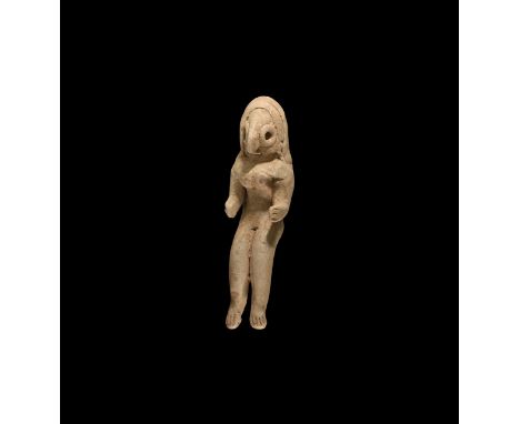 4th-3rd millennium BC. A seated ceramic figure of a female (priestesss?) with applied bands to the top of the head for hair, 