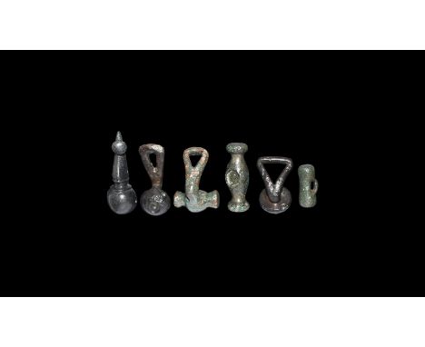 1st century BC-1st century AD. A mixed group of bronze clothes fasteners from the Rudd collection comprising: CE31 toggle of 