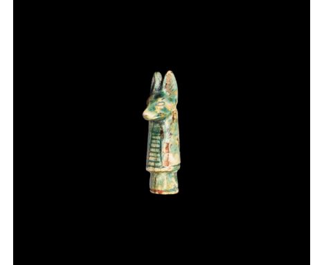 Saite Period, 624-525 BC. A yellow-green glazed composition jackal-head of Anubis with plaque to the chest. Cf. Andrews, C. A