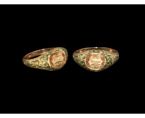 19th century AD. A D-section gold hoop with flared shoulders, green enamel detailing to a complex meander pattern, circular b