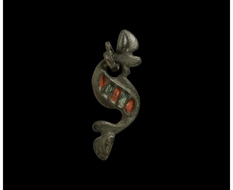 1st century AD. A bronze dragonesque brooch of simplified West Brigantian type with five rectangular enamelled panels to the 