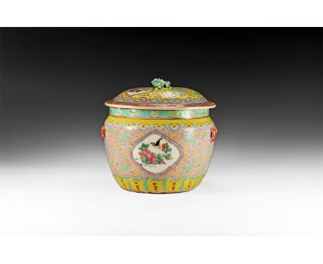 19th century AD. A large glazed ceramic jar with drum-shaped body, shallow shoulder, domed lid; four loops below the shoulder