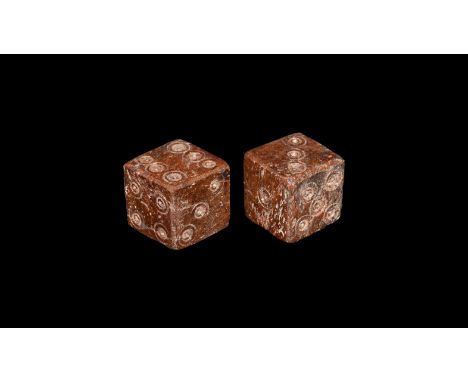 1st-2nd century AD. A matched pair of bone cuboid dice with ring-and-dot markings arranged 1:6 2:3 4:5. Cf. Allason-Jones, L.