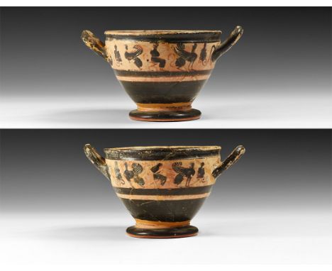 5th century BC. A ceramic drinking vessel with pedestal foot, bulbous body with shallow gallery below the rim, two strap hand