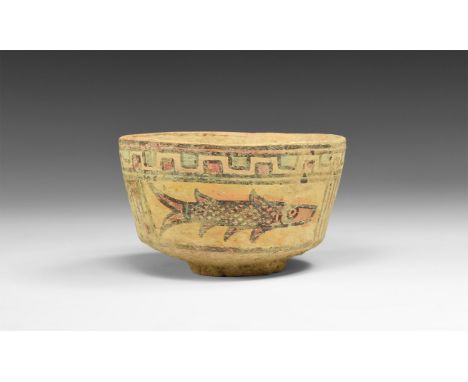 4th-3rd millennium BC. A ceramic bowl with basal ring, polychrome geometric decoration to the outer face enclosing two panels