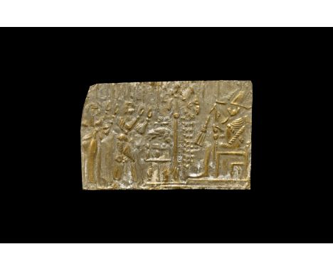 Late Period, 664-332 BC. A gold plaque with a scene with Osiris seated on a throne wearing the atef crown, holding a crook, f