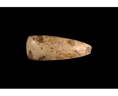 Neolithic, 8th-5th millennium BC. A polished flint axe of 'cuttlefish' type with gently curved edge and narrow butt. Recorded