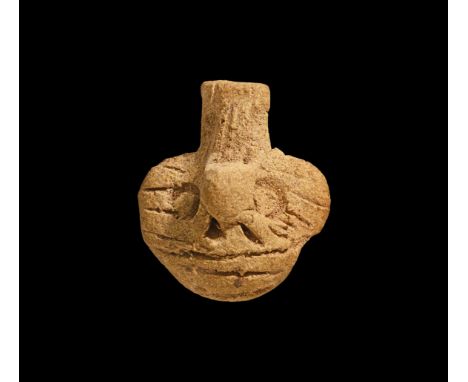 Third Intermediate Period, 1069-702 BC. An ochre glazed composition male head amulet with loop to the reverse. Cf. Andrews, C