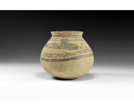 3rd-2nd millennium BC. A ceramic jar with flared rim, polychrome frieze to the shoulder with fish, pellets and wavy lines to 