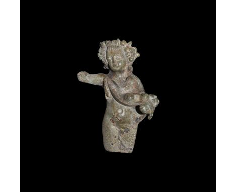 1st century BC-2nd century AD. The upper part of bronze figure of Bacchus with a mantle draped on his left shoulder supportin