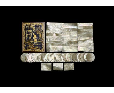 Early 19th century AD. A boxed set of mother of pearl (nacre) gaming counters; the counters (3 short rectangular, 30 long rec