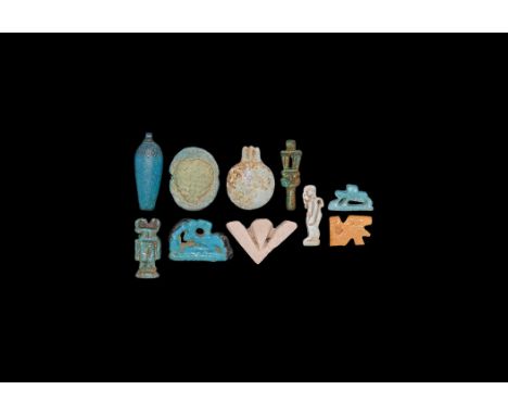 Mainly Late Period, 664-332 BC. A mixed group of glazed composition and stone amulets including a lotus leaf, wedjat, figure 