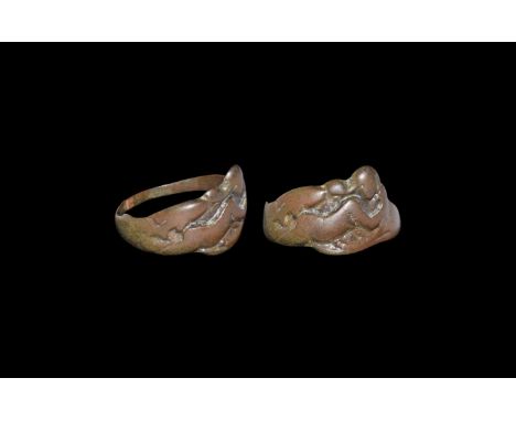 2nd-1st century BC. An unusual bronze ring with a low-relief motif of a nude Nereid and fish.  2.32 grams, 20.62mm overall, 1