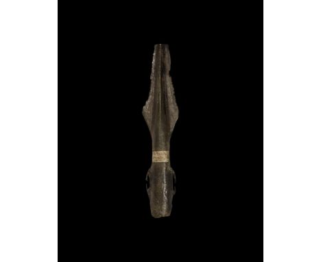 2nd millennium BC. A bronze spearhead fragment with lozenge-shaped blade, tapering midrib and socket, lateral flanges; old co