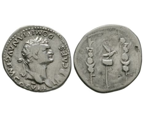 82 AD. Rome mint for Asia. Obv: IMP CAESAR DOMITIANVS AVG P M COS VIII legend with laureate head right. Rev: aquila between t