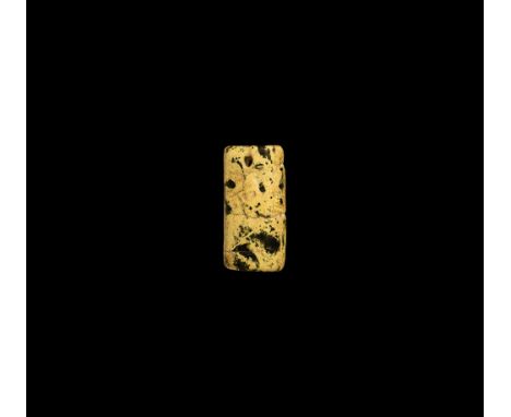Ptolemaic Period, 332-30 BC. A D-section rectangular serpentine amuletic plaque with low-relief image of a facing female in p