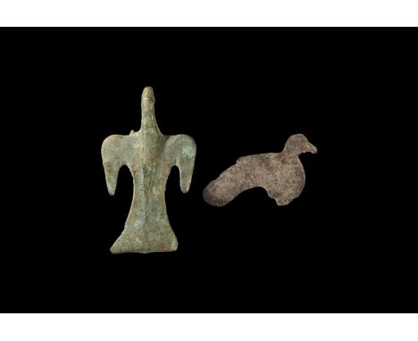 2nd century AD. A pair of bronze plate brooches comprising: a bird with raised head, short wings, hinged pin and catch to the