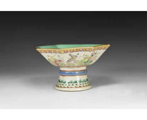 19th century AD. A glazed ceramic pedestal bowl, octagonal in plan with turquoise-coloured inner face, frieze of flowers and 