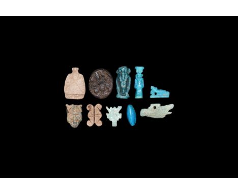 Mainly Late Period, 664-332 BC. A mixed group of glazed composition and stone amulets including a Red Crown, figure of Bes, w