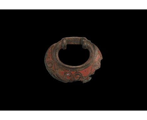 2nd century BC-1st century AD. A bronze flat-ring terret of the Iceni with moustache-like La Tène swirls, reinforced inner ed