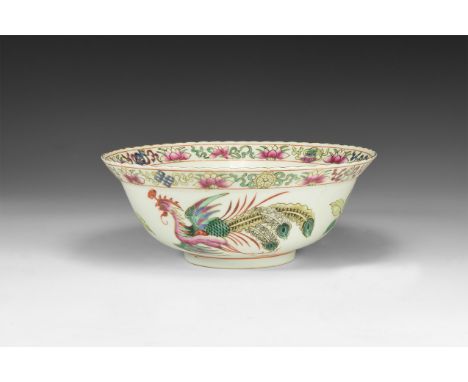 19th century AD. A broad ceramic famille rose bell-shaped bowl with floral motif to the inner face and border, dentilled rim,