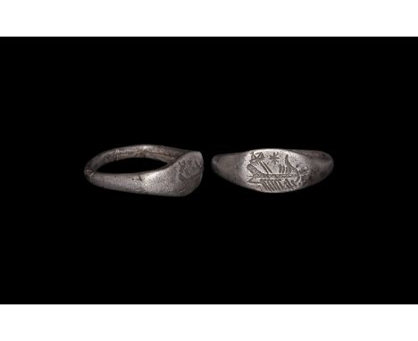 1st century BC-1st century AD. A silver rectangular-section loop with a flatten elliptic bezel, engraved galley and star.  3.