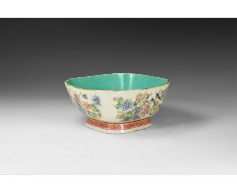 19th century AD. A rectangular ceramic bowl with fluted corners, turquoise glazed inner face, frieze of flowers and birds to 