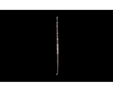 1st-3rd century AD. A silver arterial hook comprising a series of turned balusters, knop finial, tapering shaft with acutely 