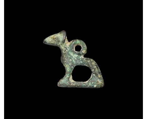 Roman Period, 30 BC-323 AD. A bronze figurine of a dog on a rectangular base with loop to the shoulders. Cf. Flinders Petrie,