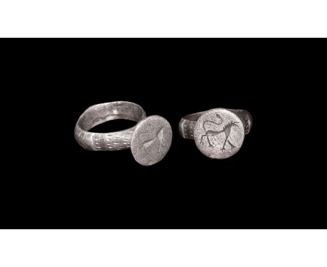 10th-12th century AD. A silver D-section ring with hatched decoration to the shank, stud to the lower edge, shoulder with ser