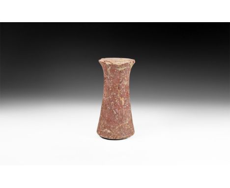 2nd millennium BC. A red limestone columnar idol, waisted with shallow slot to both flat faces. See Linenthal, P. Columns, Di