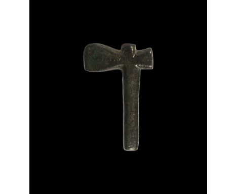 2nd century BC-1st century AD. A bronze miniature axe with rilled band to one face.  3.62 grams, 25mm (1"). The Chris Rudd co