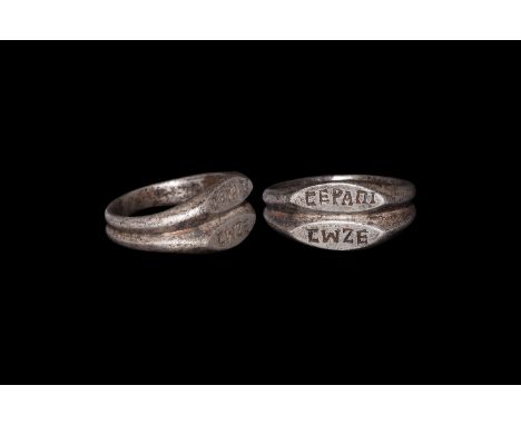 2nd-3rd century AD. A silver ring with gussetted hoop, two scaphoid plaques with incised legend 'CEPAΠI / CWZE' (May Serapis 