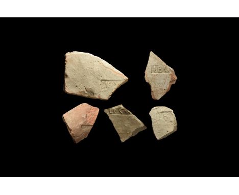 1st-2nd century AD. A group of five ceramic roof tiles with military stamp, each reding 'LEG(IONIS)', meaning 'legion'.  3 kg