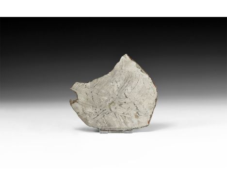 Discovered 1967. A polished section slice of the meteorite, the cut surfaces showing a distinctive Widmanstätten pattern. Cf.