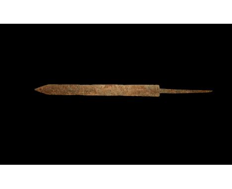 1st-2nd century AD. An iron blade for a gladius short sword, parallel-sided and lentoid in section with long rectangular-sect