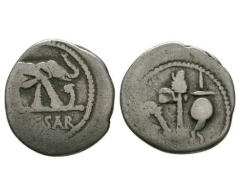 49-48 BC. Rome mint. Obv: CAESAR legend in exergue, elephant right, trampling on serpent. Rev: sacrificial implements: simpul