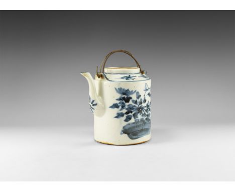 Late Qing Dynasty, 20th century AD or later. A white-glazed drum-shaped ceramic vessel with raised rim and curved tapering sp