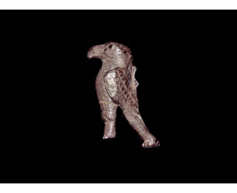 1st century AD. A silver amuletic figurine of an eagle with feather detailing to the wings and chest, discoid finial to the t