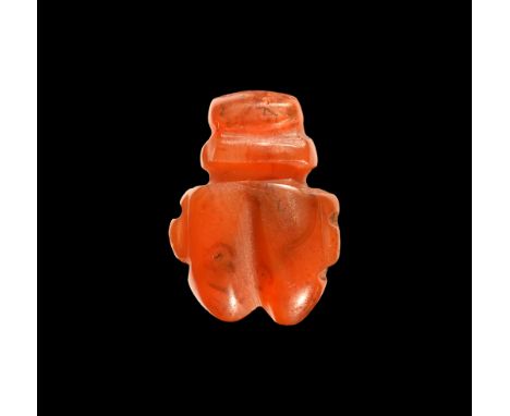 New Kingdom, 1550-1070 BC. A carved carnelian amulet of two conjoined hearts modelled in the round. See Andrews, C. Amulets o