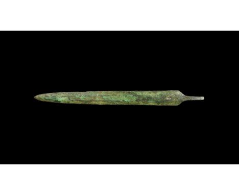 2nd millennium BC. A bronze dagger, lentoid in section with short flat-section tang, blade marked with old accession number H