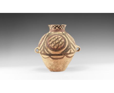 Majiayao Culture, 3300-2000 BC. A ceramic jar with flaring rim and short neck, globular body with painted decoration of net p