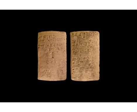 Ur III, dated to 2036 BC.  A baked clay pillow-shaped tablet from an important palace archive of the Sumerian city Iri-Saĝrig