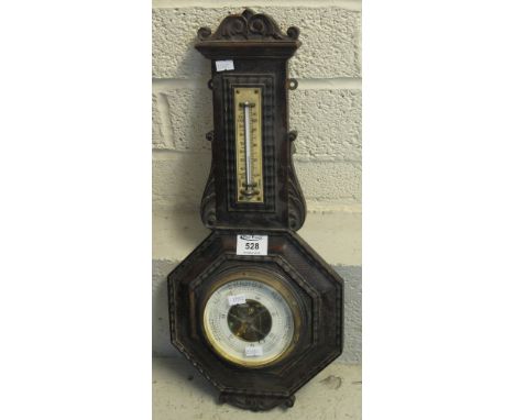 Small early 20th Century carved oak octagonal wall barometer.(B.P. 24% incl. VAT)