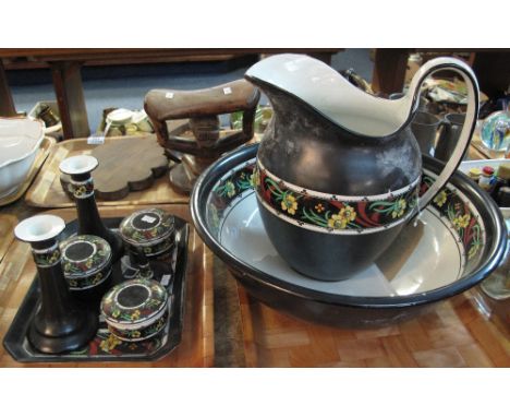 Early 20th Century black ground, floral, transfer printed jug and basin, together with matching lady's dressing table items.(