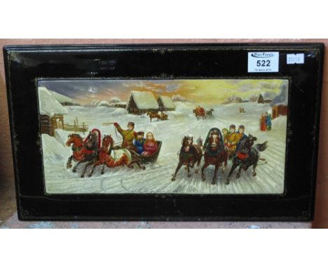 Russian School, a lacquered papier mâché panel painted with a winter scene featuring racing Troikas in a village landscape, o