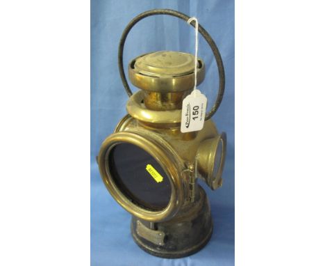 Lucas King of the Road brass vehicle lamp with red glass main lens and white side lenses, marked: no. 432 with steel loop han