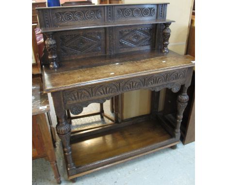 17th Century style oak carved hall table with under shelf.(B.P. 24% incl. VAT) 